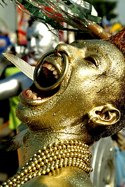 Golden painted man at carnival, Baranquilla, Colombia, South America