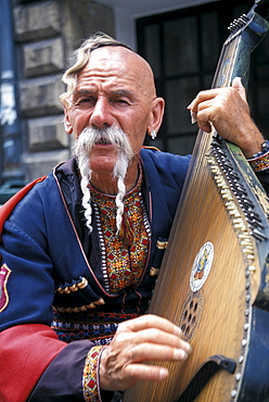 Street Musican in Traditional Costume, Cracow, Poland