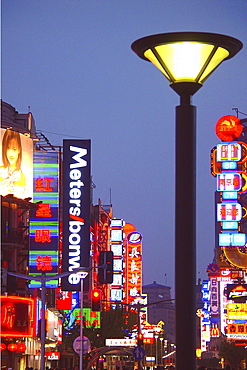 Steet lamp and neon signs in the evening, Nanjing road, Shanghai, China, Asia