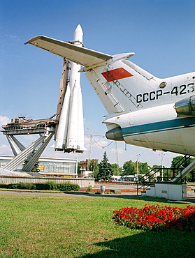 Soyuz rocket and tail of Yak-42 airplane in All-Russia Exhibition Centre, Moscow, Russia, before 2003