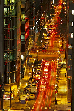 Cars on a street downtown in the evening, Business District, 17th Street, Philadelphia, Pennsylvania, USA, America