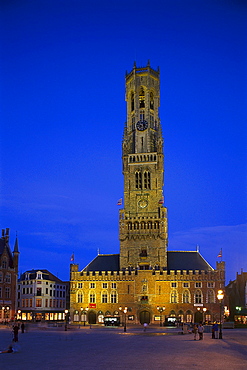 The illuminated tower Belfried at the market square at night, Bruges, Flanders, Belgium, Europe