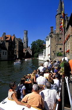 Rosenhoedkai, people on a boat in a canal, Bruges, Flanders, Belgium, Europe