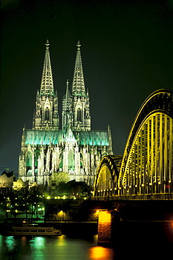 Cologne Cathedral and Hohenzollern bridge at night, Cologne, North Rhine-Westphalia, Germany, Europe