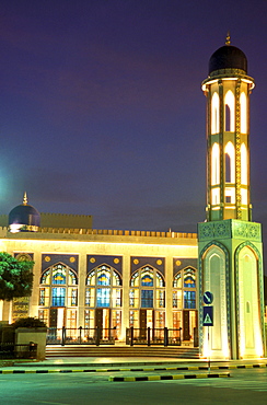 Illuminated mosque at night, Muscat, Oman, Middle East, Asia