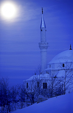 Mosque in winter at fullmoon, Sakklikent, close to Antalya, Turkey