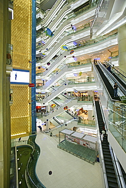 Shopping Shanghai, New World, Yao Han, shopping mall, escalator, shops, stores, mega malls, multi storey, advertising, consumers, fashion, design, atrium