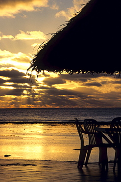 Deck Chair and Umbrella Sunset Silhouette, The Edgewater Resort, Rarotonga, Cook Islands