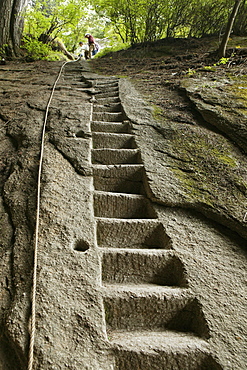 pilgrim path along stone steps with rope handrail, Hua Shan, Shaanxi province, Taoist mountain, China, Asia