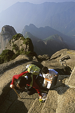 steep rock carved stone steps to Lotus Peak, Huang Shan, Anhui province, steep climb, stone steps, World Heritage, UNESCO, China, Asia