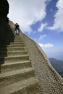 steep rock carved stone steps to Lotus Peak, Huang Shan, Anhui province, steep climb, stone steps, World Heritage, UNESCO, China, Asia