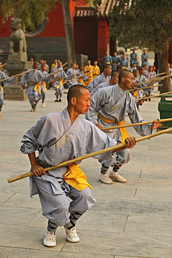 Shaolin Buddhist monks rehearsing for a performance on Buddhas birthday, Shaolin Monastery, known for Shaolin boxing, Taoist Buddhist mountain, Song Shan, Henan province, China