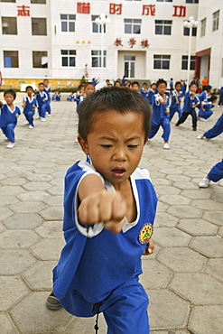 Kung Fu training at kindergarten age, at one of the many new Kung Fu schools in Dengfeng, school near Shaolin, Song Shan, Henan province, China, Asia