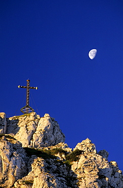 Summit of Kampenwand with cross and moon, Chiemgau range, Chiemgau, Bavarian range, Upper Bavaria, Bavaria, Germany