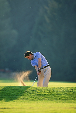 Man playing golf, Munich Golf Club, Strasslach, Munich, Bavaria, Germany, Europe