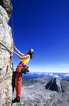 climber on fixed rope route Irg, Koppenkarstein, Dachstein range, Styria, Austria