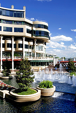 Office buildings and fountain under blue sky, Georgetown, Washington DC, America, USA