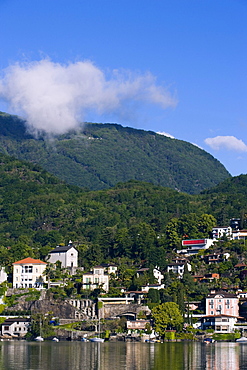 View over Lake Lugano to Lugano with low-hanging clouds, Lugano, Ticino, Switzerland