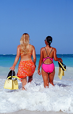 Two female scin diver on the beach, Punta Cana, Caribbean, Dominican Republic