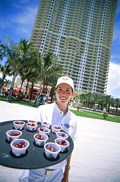 Waitress with refreshments, Hotel Acqualina Resort, Sunny Isles Beach, Miami, Florida, USA