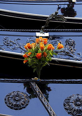 Gondola with buch of roses, detail, Venice, Veneto, Italy