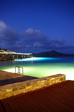 Hotel terraces at sea, Elounda, Agios Nikolaos, Crete, Greece