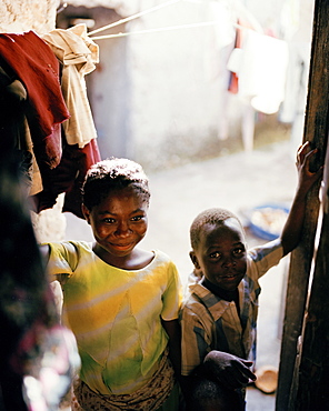 Girl in courtyard, family house, traditional coral stone house, Jambiani village, Zanzibar, Tanzania, East Africa