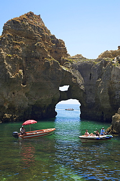 Boats and bizar rock formations, Ponta da Piedade, near Lagos, Algarve, Portugal, Europe