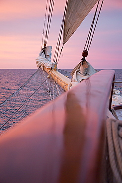 Railing and bowsprit of sailing cruise ship Star Flyer at sunset, Baltic Sea, Latvia, Baltic States, Europe