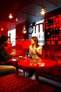 Couple inside hotel's on-site restaurant, Brussels, Belgium