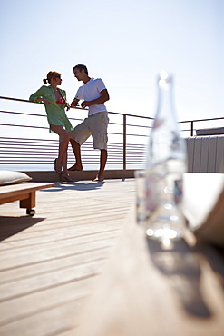 Couple standing on the suite terrace, Hotel La RÃˆserve Ramatuelle, Chemin de la Quessine, Ramatuelle, France