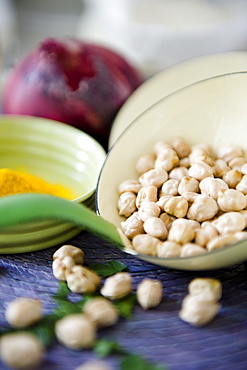 Chickpeas on a spoon, pulses in a soup, stew, Homemade