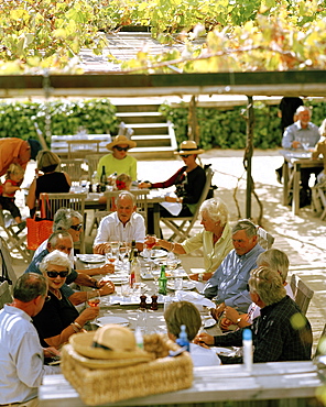 People sitting on the terrace of the restaurant of Black Barn Vineyards, Havelock North, HawkeâˆšÃ‡Â¬Â¥s Bay, North Island, New Zealand