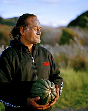 Mature Maori man with facial tatoo, Te Araroa, Eastcape, North Island, New Zealand