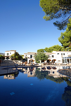 Ducal suites and large hotel pool, Punta Negra H10 Hotel, near Portals Nous, west of Palma, Mallorca, Balearic Islands, Spain