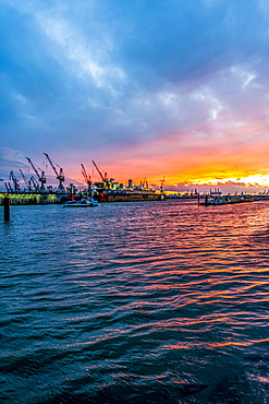 Sunset inHamburg harbour and the shipyard Blohm+Voss, Hamburg, Germany