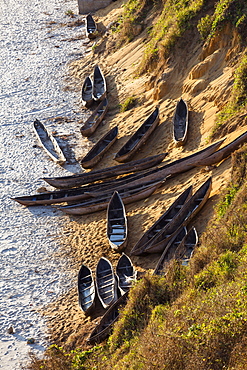 Dug out canoes along the cliffs of Tolagnaro, Fort Dauphin, South, Madagascar, Africa