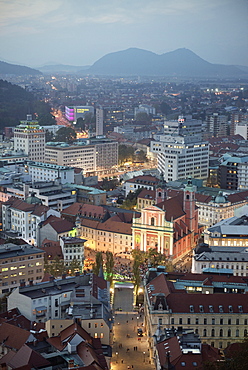 View at Franciscan church of the annunciation from castle at dusk, capital Ljubljana, Slovenia