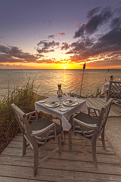 Restaurant DINING ROOM at sunset, Little Palm Island Resort, Florida Keys, USA