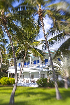 Moorings Village Resort with wooden villa BLUE CHARLOTTE in the background, Islamorada, Florida Keys, Florida, USA