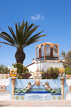 Villa with decorative wall and sculptures, Nature reserve, Corralejo, Fuerteventura, Canary Islands, Spain, Europe