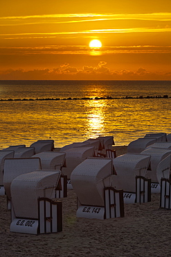 Hooded beach chairs near Sellin pier in the morning light, Ruegen, Mecklenburg-Western Pomerania, Germany