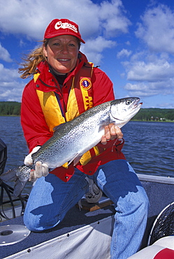 Woman with a Rainbow Trout, Northern Ontario