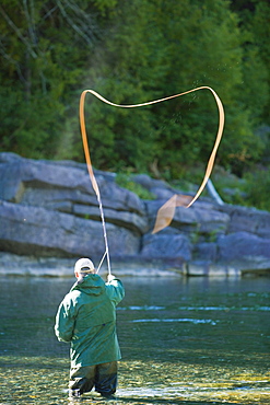 Fisherman on Bonaventure River at Sunrise, Gaspesie Region, Quebec