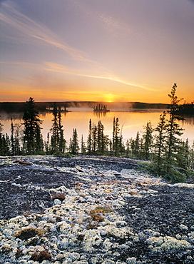 Sunset over Subarctic Lake, Ingraham Trail area, Northwest Territories, Canada