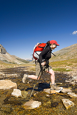 Woman Hiking through Skyline Trail, Jasper National Park, Alberta