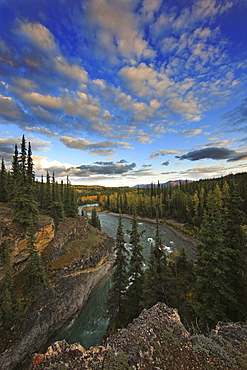 Clouds after a rain storm at sunset in autumn, Lapie River, Yukon