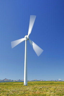 Wind turbine with the Rocky Mountains in the background, Pincher Creek, Alberta