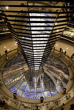 Inside Norman Foster's Dome of the Reichstag Building at night, Berlin, Germany