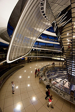 Inside Norman Foster's Dome of the Reichstag Building at night, Berlin, Germany